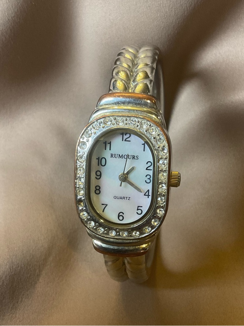 Rumours Quartz Watch Gold Tone Stretch Band Rhinestone Bezel Women’s Dress Watch